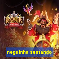 neguinha sentando